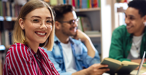 Girl smiling while reading